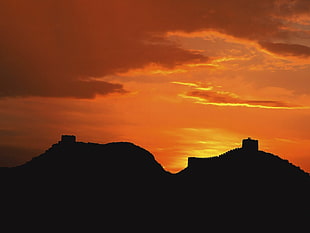 silhouette of mountain during sunset