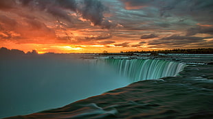 waterfalls during sunset HD wallpaper