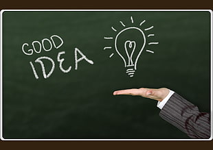 person showing Good Idea logo HD wallpaper