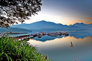 boats near dock with mountains, sun moon lake, taiwan HD wallpaper