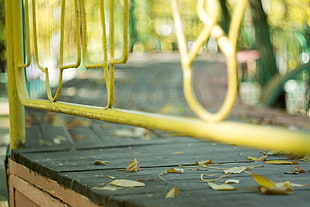 yellow metal fence