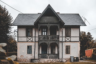 white and black 2-storey house