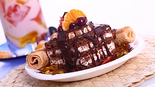 brown cake on white plate