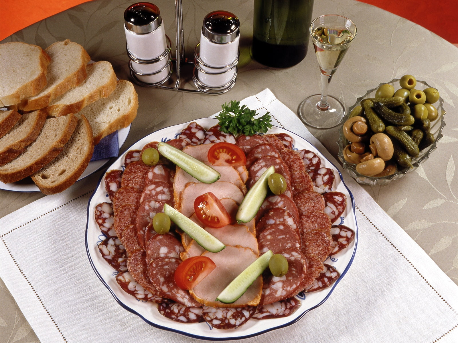 tomato slice and meat on clear glass bowl