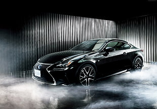 photo of black Lexus coupe with smoke background