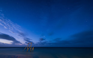 panoramic photography of shoreline, sea and blue sky