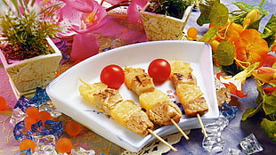 barbeque skewers in white ceramic tray garnish with two cherry tomatoes HD wallpaper