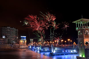 fireworks display near on high rise buildings