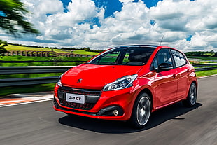 red Peugeot 208 GT