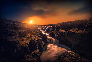 timelapse photography of flowing multi-tier waterfall during sunset HD wallpaper