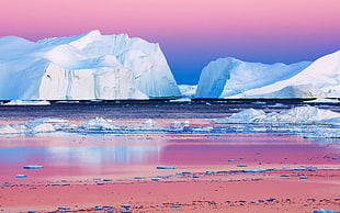 blue body of water and snow covered mountain, iceberg