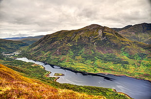 aerial photography of mountain and body of water under white clouds, loch leven, leven, scotland