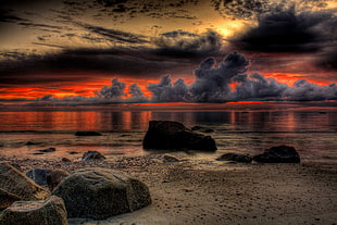 still life photo of  black rocks  during  sunset