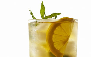 lemon juice in clear drinking glass HD wallpaper