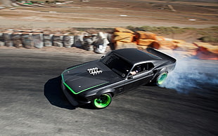 black coupe drifting