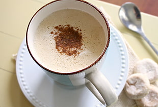 white ceramic cup on white saucer plate