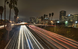 timelapse photography of cars going north and south HD wallpaper