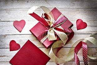 top-angle photography of red and brown present box with bow ribbon HD wallpaper