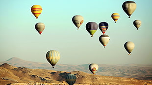 three brown wooden framed wall decors, hot air balloons