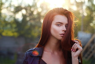 woman wearing black leather tops