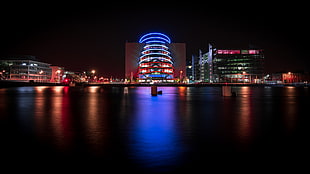 lighted cityscape near body of water, dublin, ireland HD wallpaper