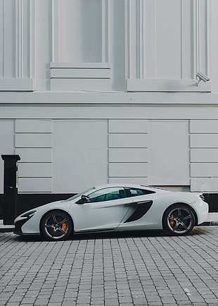 white and black McLaren P1 coupe