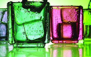 purple and green glass bottles HD wallpaper