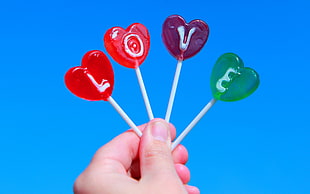 four assorted-color lollipops, love, candies HD wallpaper