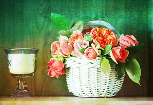 red Rose and orange Peony flowers in brown wicker basket beside tealight candle HD wallpaper