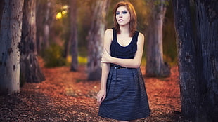 woman wearing black and gray tank dress standing near trees HD wallpaper