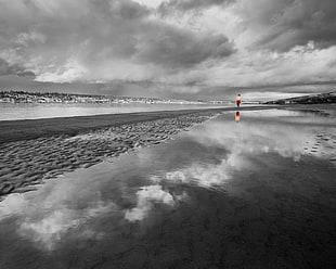 person Standing on sea shore