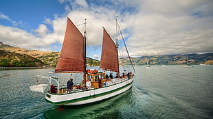 white sailing boat, boat, vehicle, water, people