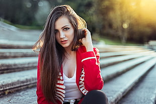 woman in red and white blazer with white scoop-neck shirt posing for a photo HD wallpaper