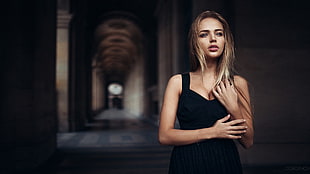 woman wearing black tank dress