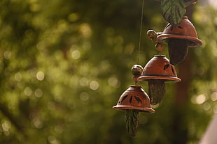 depth of field photography of brown hanging decor