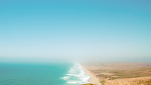 photography of sea wave on seashore