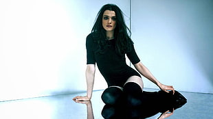 woman in black bodysuit wearing pair of black thigh-high socks HD wallpaper