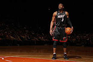 selective focus photography of Dwyane Wade holding ball HD wallpaper