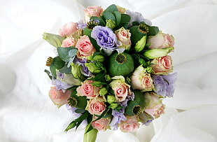 pink and purple Roses bouquet closeup photo