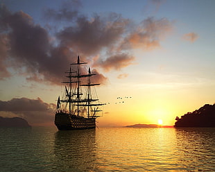galleon at sea during golden hour HD wallpaper