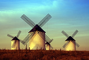 four brown-and-white windmills HD wallpaper