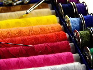 photography of sewing threads HD wallpaper