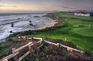 body of water and golf field