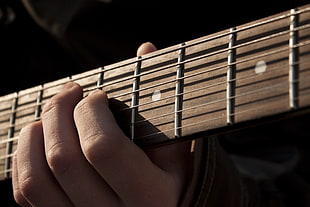 person holding guitar chords HD wallpaper