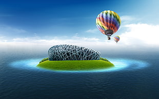 hot air balloon near island HD wallpaper