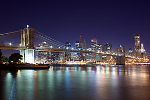 brown bridge near skyscraper during nighttime, brooklyn bridge, manhattan, empire HD wallpaper