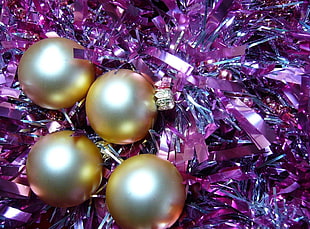 four gold baubles