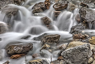 water flowing on rocks