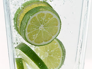 close-up photo of sliced limes