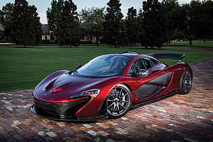 red and black coupe luxury car